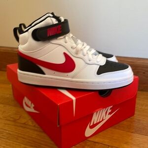 Brand new Boys Nike Court Borough Mid 2. Size 4y